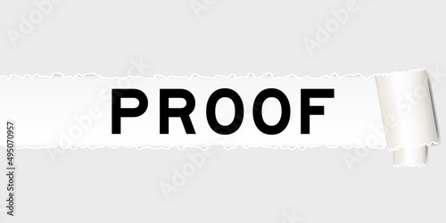 Ripped gray paper background that have word proof under torn part