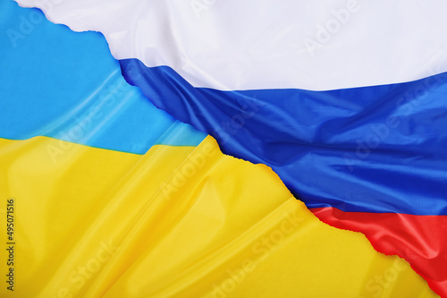 Background of Ukraine country flag versus Russia flag