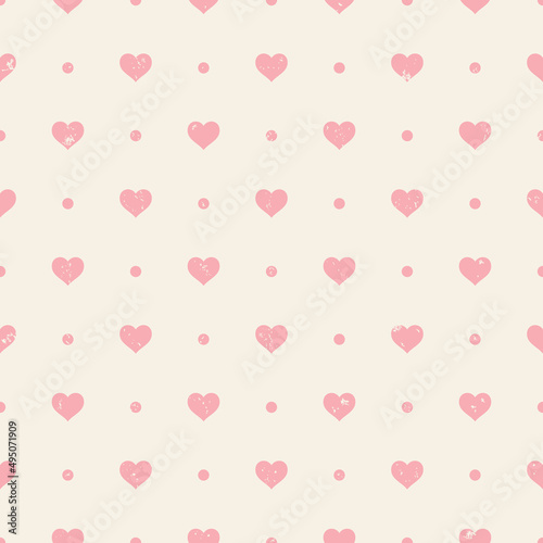 Retro grunge seamless pattern. Pink hearts and dots on beige background