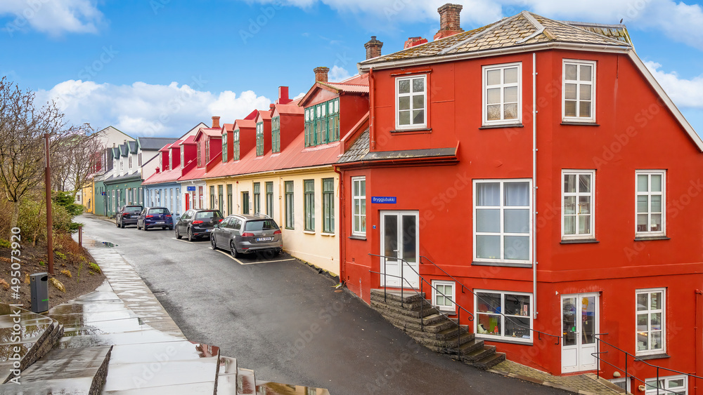 Torshavn, Faroe Islands; March 21, 2022 - Colourful town house on the waterfront in Torshavn, Faroe Islands.