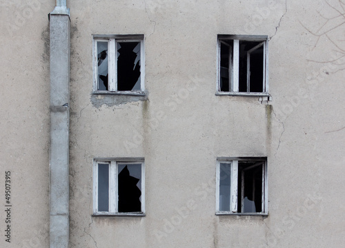 Broken window in the wall of the building