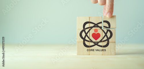 Core values,corporate values concept.  Company culture and strategy related to business, people relationships, company growth. Principles guide company's action. Core values icon on wood block. Banner photo