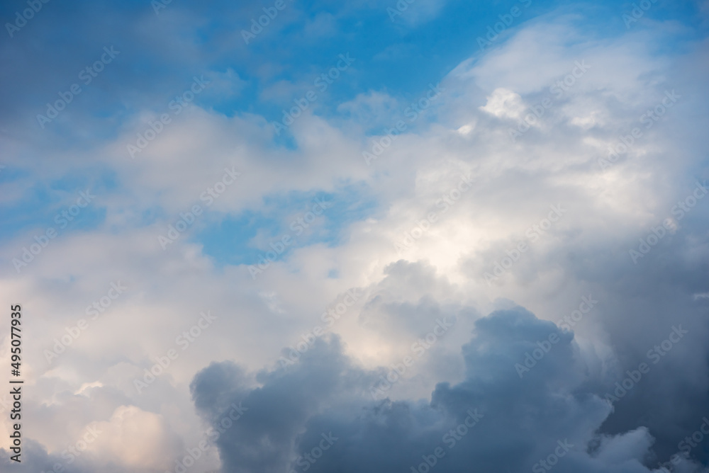 Fototapeta premium Stormy Clouds In The Blue Sky. Cyclone Coming. The Weather Is Getting Worse, Rain Is Coming.