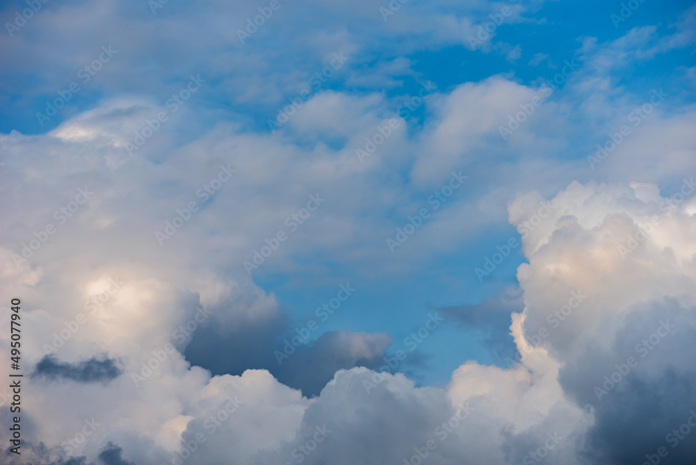 Fototapeta premium Stormy Clouds In The Blue Sky. Cyclone Coming. The Weather Is Getting Worse, Rain Is Coming.