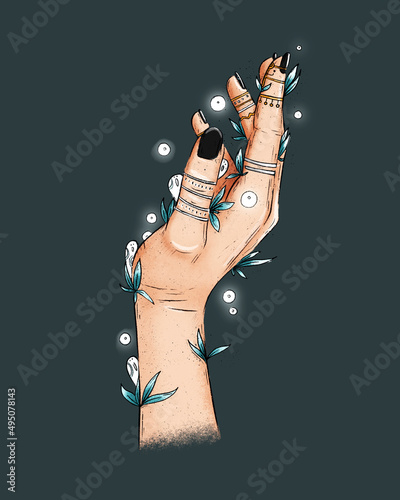 Female witch mystical hands with tatooes, rings, herbs and plants. Female magical hands with white spirits and white fireflights. Spellings, voodoo and magical rituals concept