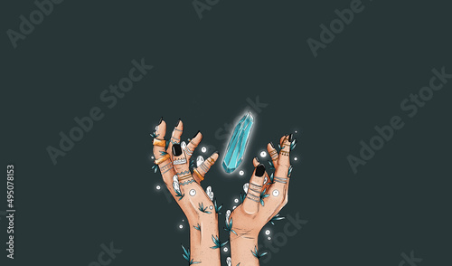 Female witch mystical hands with tatooes, rings, herbs and plants. Female magical hands with white spirits and white fireflights. Spellings, voodoo and magical rituals concept