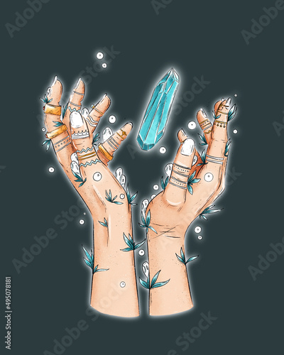 Female witch mystical hands with tatooes, rings, herbs and plants. Female magical hands with white spirits and white fireflights. Spellings, voodoo and magical rituals concept