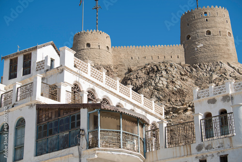 Muscat,Oman - March 05,2019 :Fortess on the hills surrounding the old town of Muttrah. photo