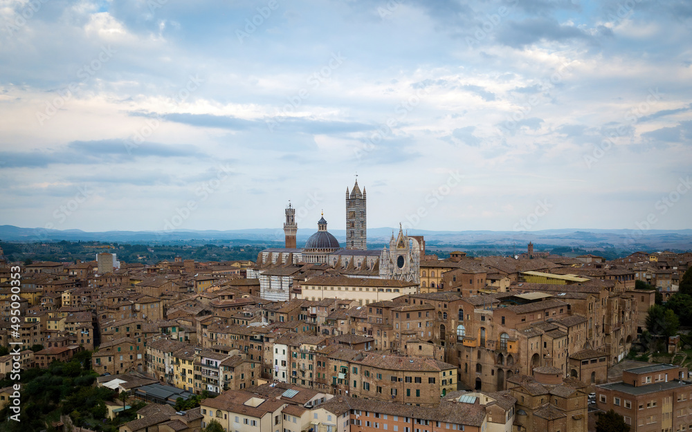 Architecture of medieval Siena town and cathedral from above. Aerial drone photo, Siena, Tuscany, Italy