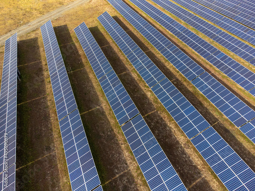 Aerial view of Solar panel, photovoltaic, alternative electricity source - concept of sustainable resources on a sunny day