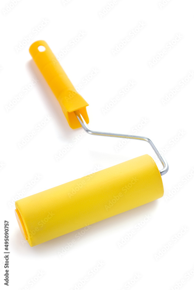 Paint roller isolated on white background. Construction tool Paint roller isolated on white background. Construction tool