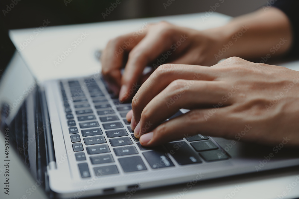 Young businessman working with laptop at home office. work process and social network concept. Young businessman working with laptop at home office. work process and social network concept.