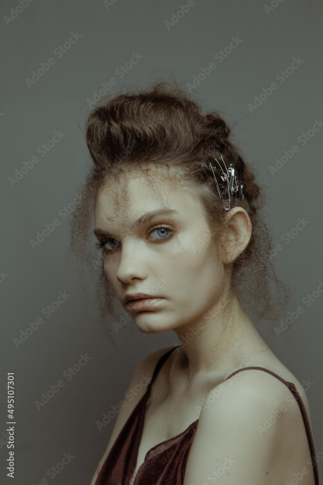 Art portrait in retro style of a beautiful girl with hair and makeup Art portrait in retro style of a beautiful girl with hair and makeup