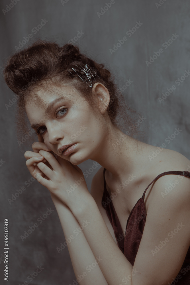 Art portrait in retro style of a beautiful girl with hair and makeup Art portrait in retro style of a beautiful girl with hair and makeup
