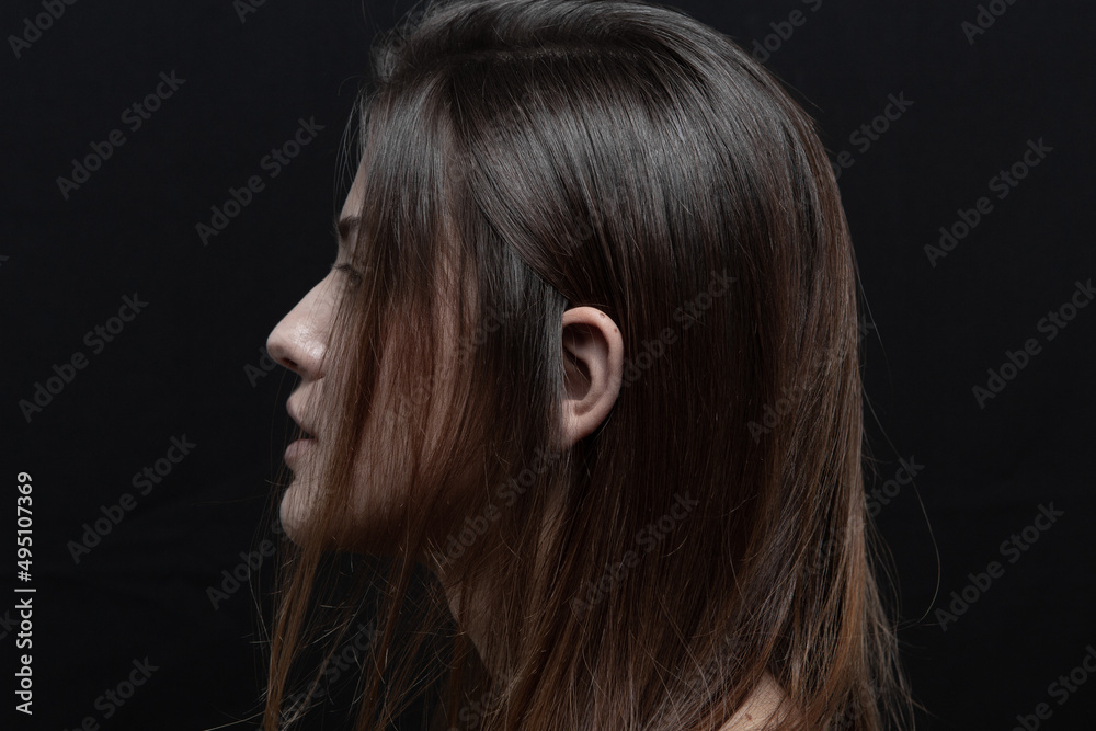 Beauty portrait of a beautiful girl with makeup and long hair Beauty portrait of a beautiful girl with makeup and long hair