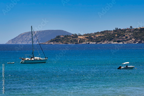 sailing and tourist boat in to the sea outside Koroni,a coastal town in Messenia, Peloponnese,Greece.Sunny day with blue sky