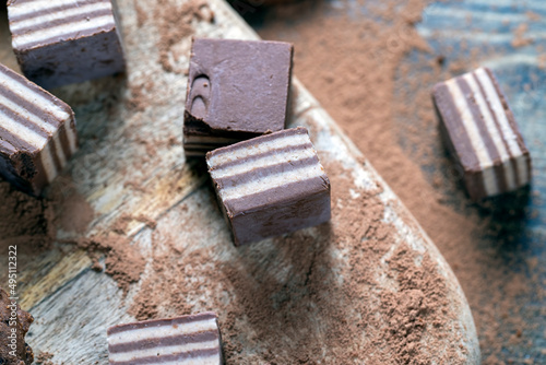 multi-layered sweets made of cream and chocolate layers