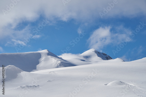 Image of a snow-capped mountain top.