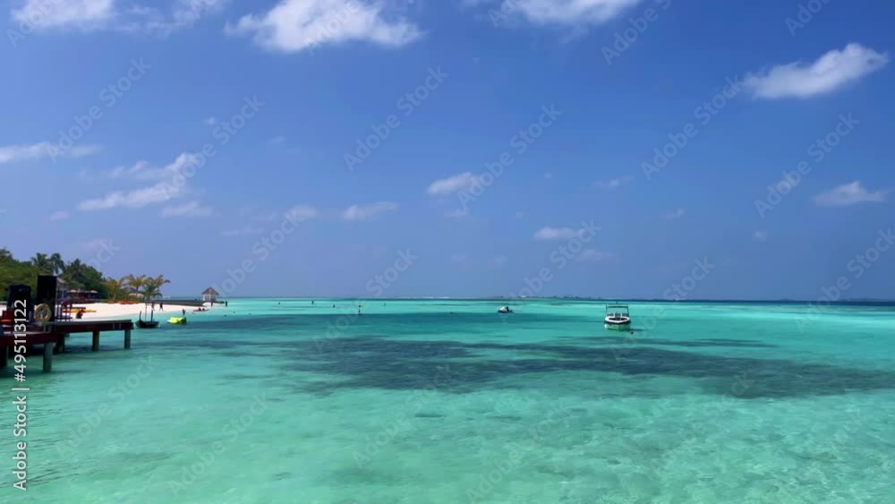 Maldives tropical landscape with sea, boat, sky Maldives tropical landscape with sea, boat, sky