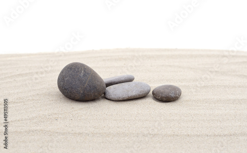 Pile of sand with sea stones.