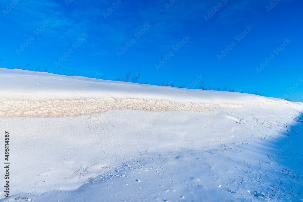 winter season with snowdrifts after snowfall