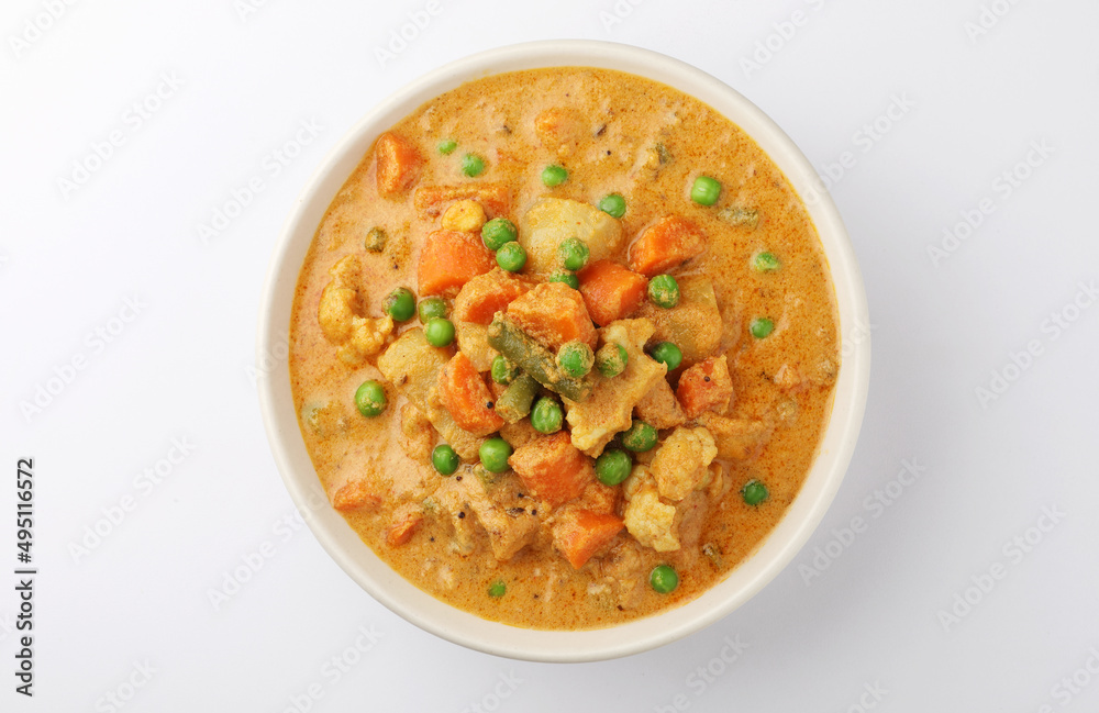 Kerala food -indian food spicy mixed vegetable curry /Mix vegetable kurma - Indian recipe contains Carrots, cauliflower, green peas and beans, baby corn traditional