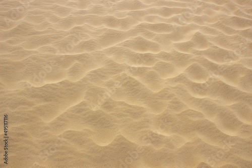 Obraz na plátně Beige sand textured background