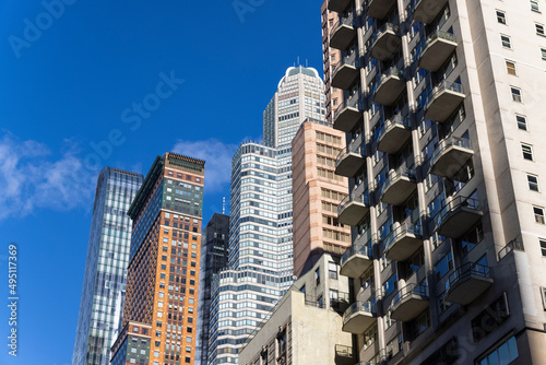 Newly built ultra luxury high-rise residential buildings stand among Midtown Manhattan skyscraper on November 03, 2021 in New York City NY USA. photo