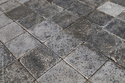 Paving slabs as a background on the embankment