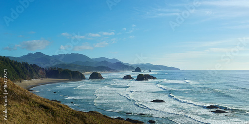 View of the ocean coastline near Cannon Beach in Oregon form viewpoint in the Ecola State Park.