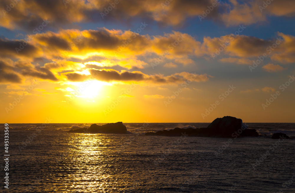 Golden summer sunset over the ocean