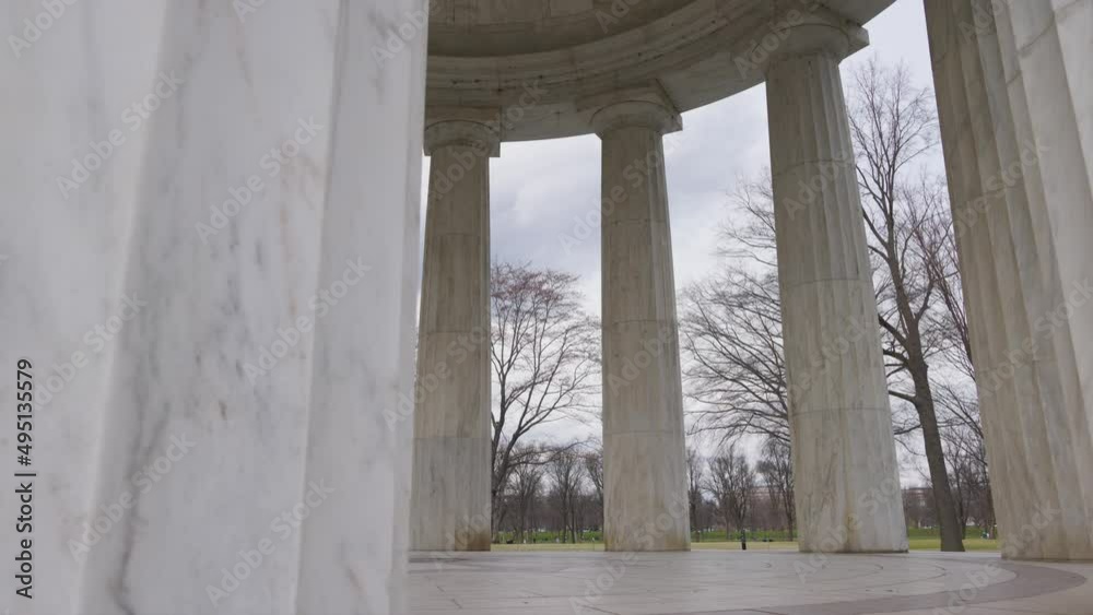 Interior shot of the columns of the District of Columbia War Memorial, a memorial to DC residents who were killed in World War I, located on the National Mall in Washington, DC. Camera trucks right. Interior shot of the columns of the District of Columbia War Memorial, a memorial to DC residents who were killed in World War I, located on the National Mall in Washington, DC. Camera trucks right.