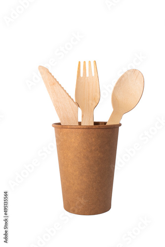 Eco brown cup and wooden khife, fork, spoon on a white background. Mockup for your and copy space