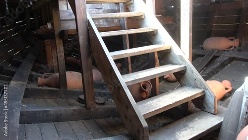 Demre, Turkey - 26th of October 2021: 4K Ladder in the lower hold of ship carring amphoras
 photo