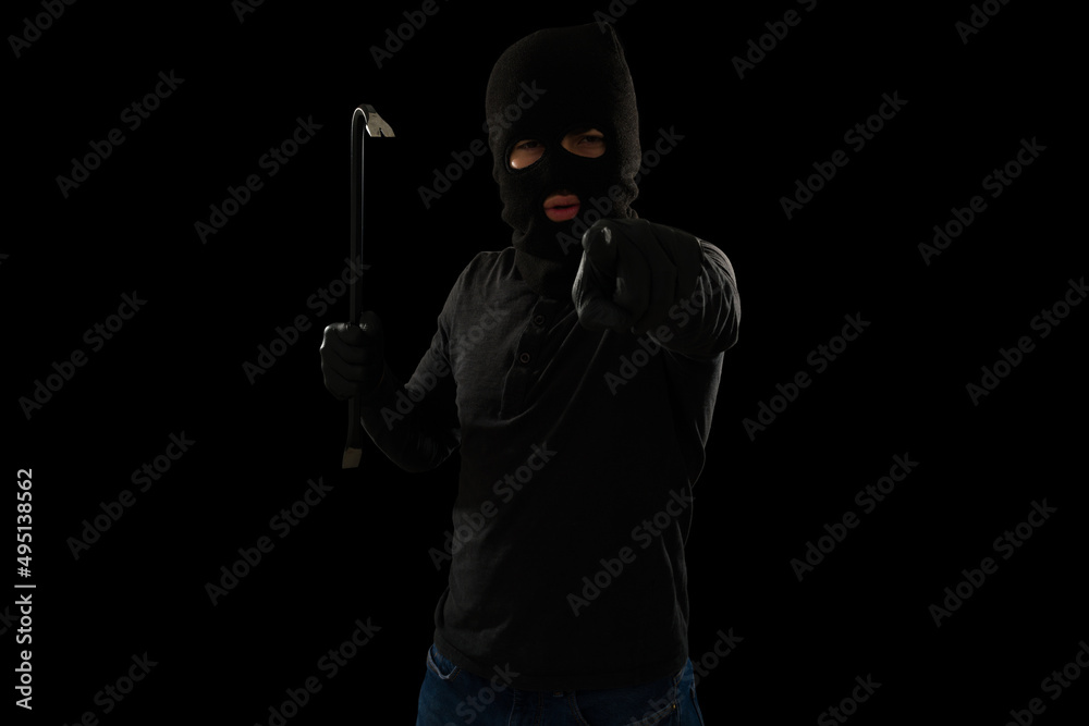 Dangerous thief pointing a finger Dangerous thief pointing a finger