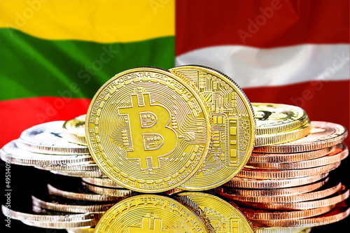 Bitcoins on the background of flag Lithuania and Latvia. Concept for investors in cryptocurrency and Blockchain technology in Lithuania and Latvia