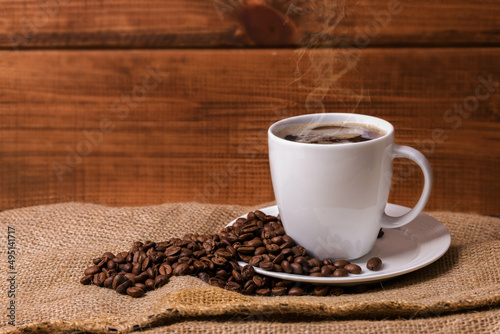 Coffee seeds with coffee cup