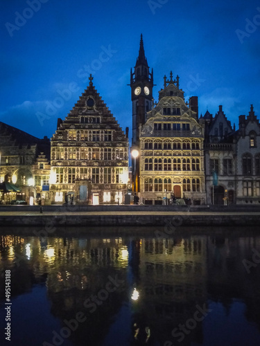 Medieval architecture of Ghent in Belgium illuminated in the evening