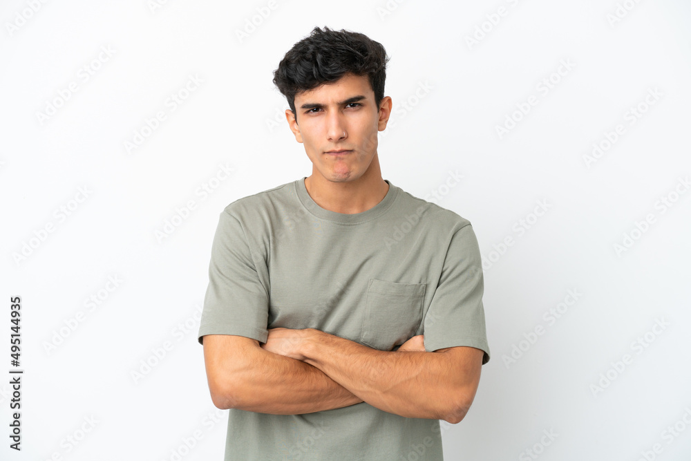 Obraz premium Young Argentinian man isolated on white background feeling upset