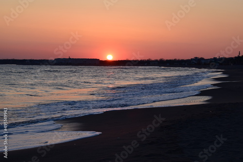 Sunset sea landscape. Warm March day,calm sea.