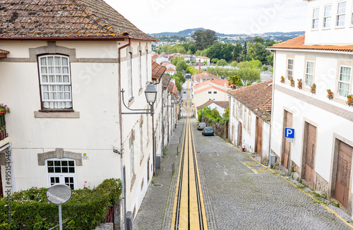 a cobbled street with tram tracks (Calçada Viriato) in Viseu, province of Beira Alta, Portugal photo
