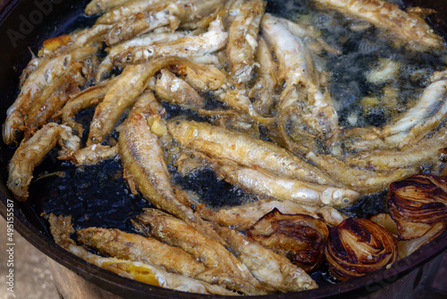 Deep fried fish in pot