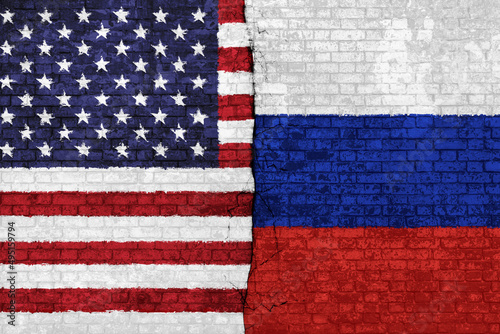 American and Russian flag on broken wall. Concept of conflict, war and custom duty. America VS Russia. Dollar ruble exchange currency and international commercial tension and crisis. 3D illustration.
