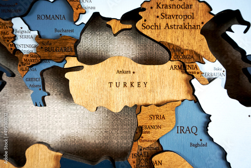 Turkey on a wooden world political map on a wall.