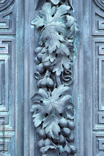 Grapevine at the northern gate of St. Isaac's Cathedral in St. Petersburg, Russia. Sculptor Vitali, the gate was made by galvanoplastic method in 1840-50s photo