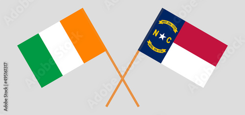 Crossed flags of Ivory Coast and The State of North Carolina. Official colors. Correct proportion