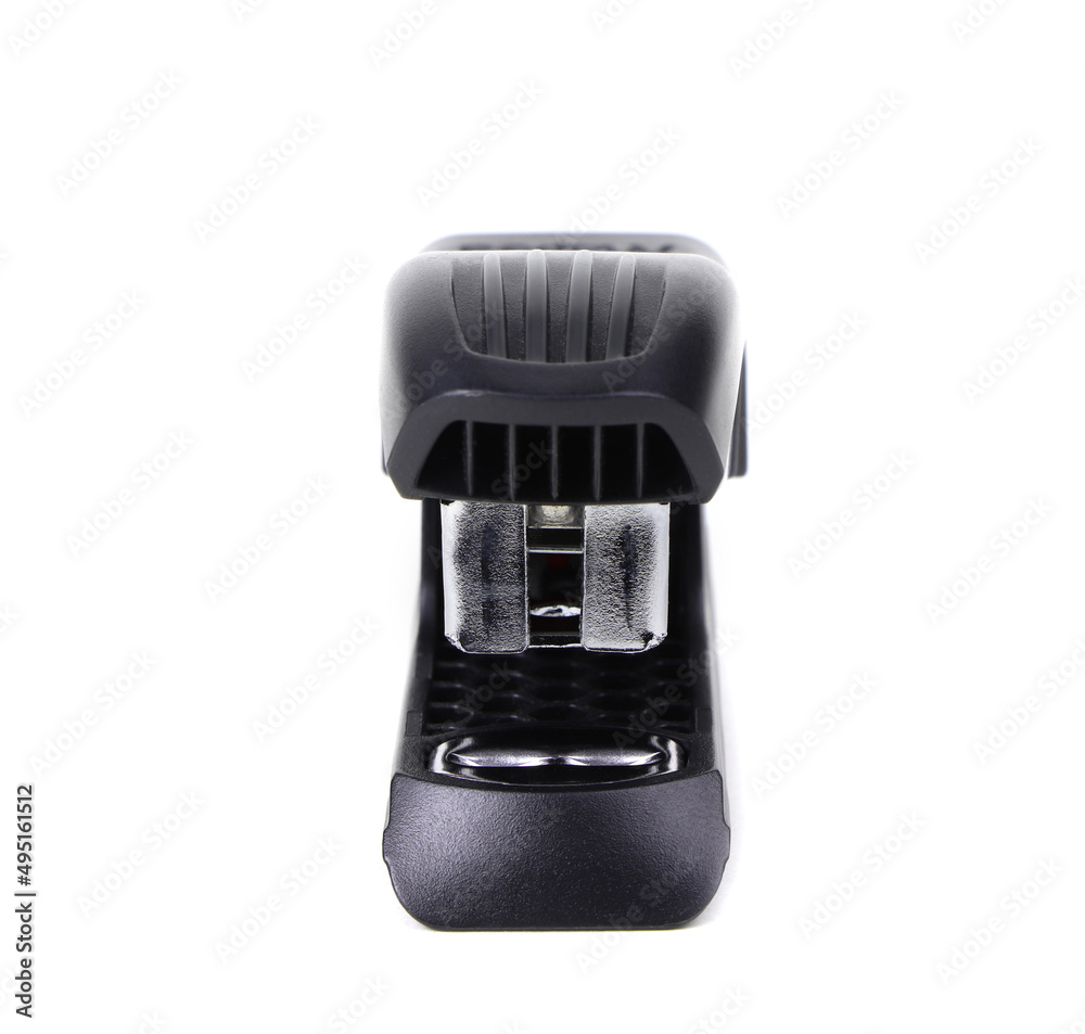 An office stapler isolated on a white background. A Black plastic stapler. Office supplies An office stapler isolated on a white background. A Black plastic stapler. Office supplies