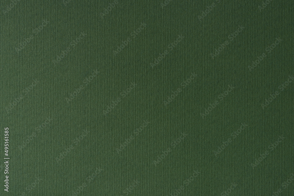 Fototapeta premium Dark green paper texture background. Close-up of drawing and fine art paper.