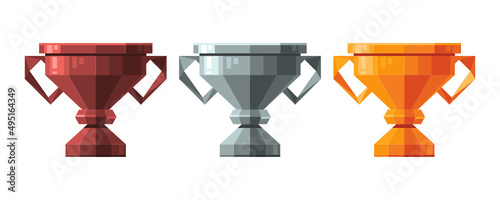 Set of the trophy cups. Award cups in different colors (bronze, silver, and gold). Flat polygonal style vector illustration.