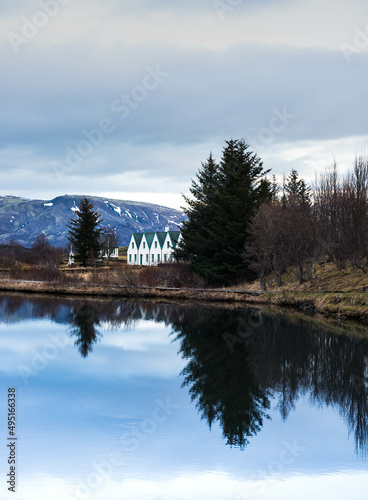House on the edge of a lake outside Reykjavik, Iceland